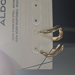 Gold tone water resistant earrings